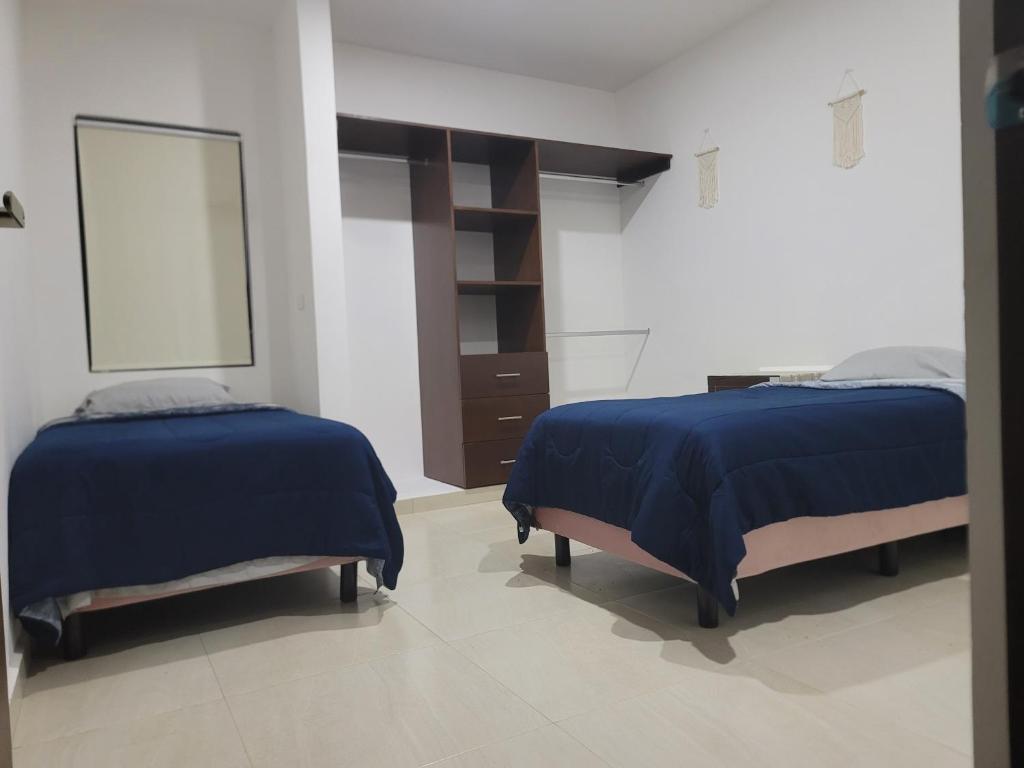 Postel nebo postele na pokoji v ubytování Casa de Dios