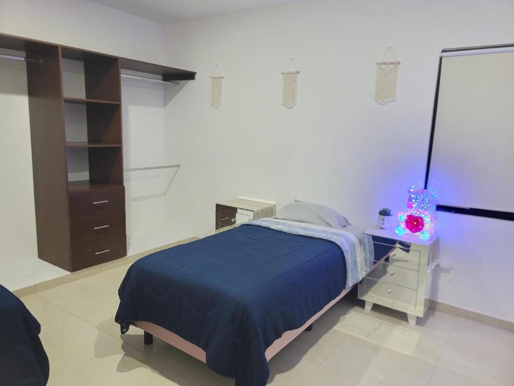 Postel nebo postele na pokoji v ubytování Casa de Dios
