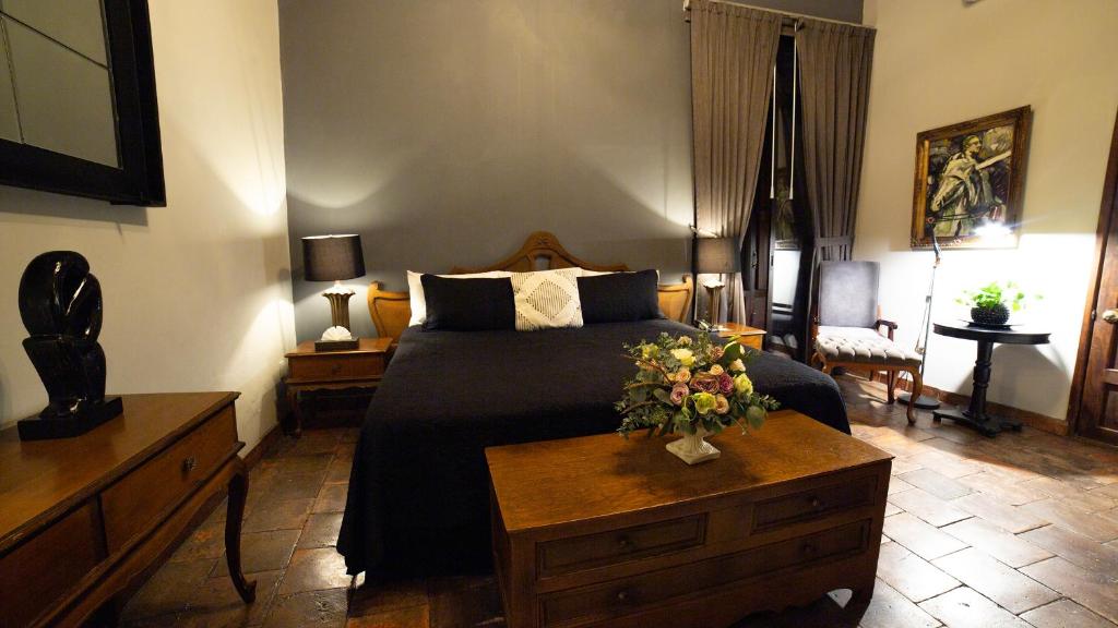 Postel nebo postele na pokoji v ubytování Casa Pedro Loza