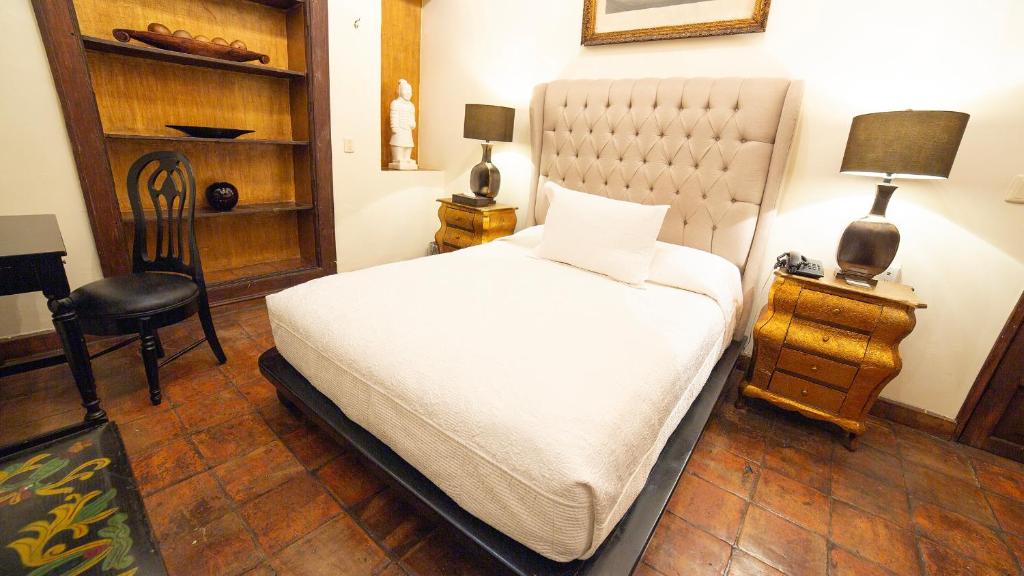 Postel nebo postele na pokoji v ubytování Casa Pedro Loza