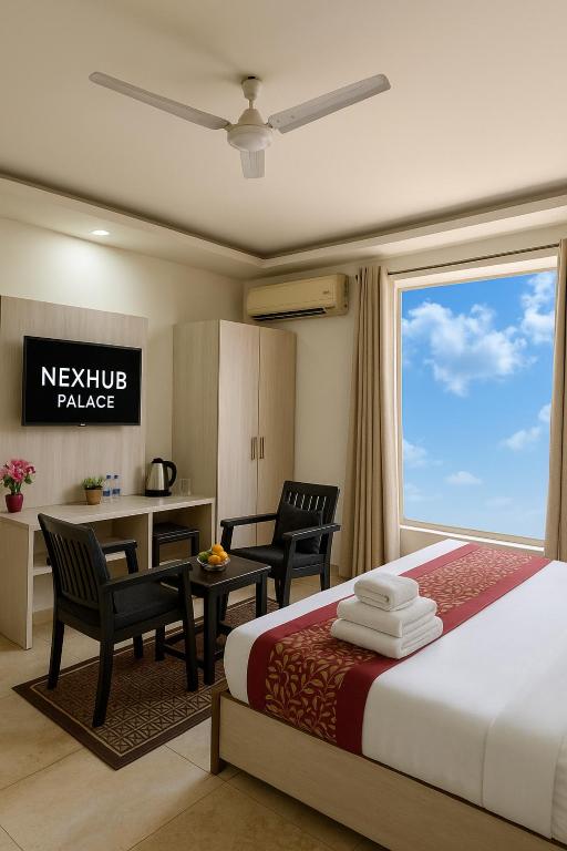 Postel nebo postele na pokoji v ubytování Nexhub Arcadia- Sector 39 Medanta