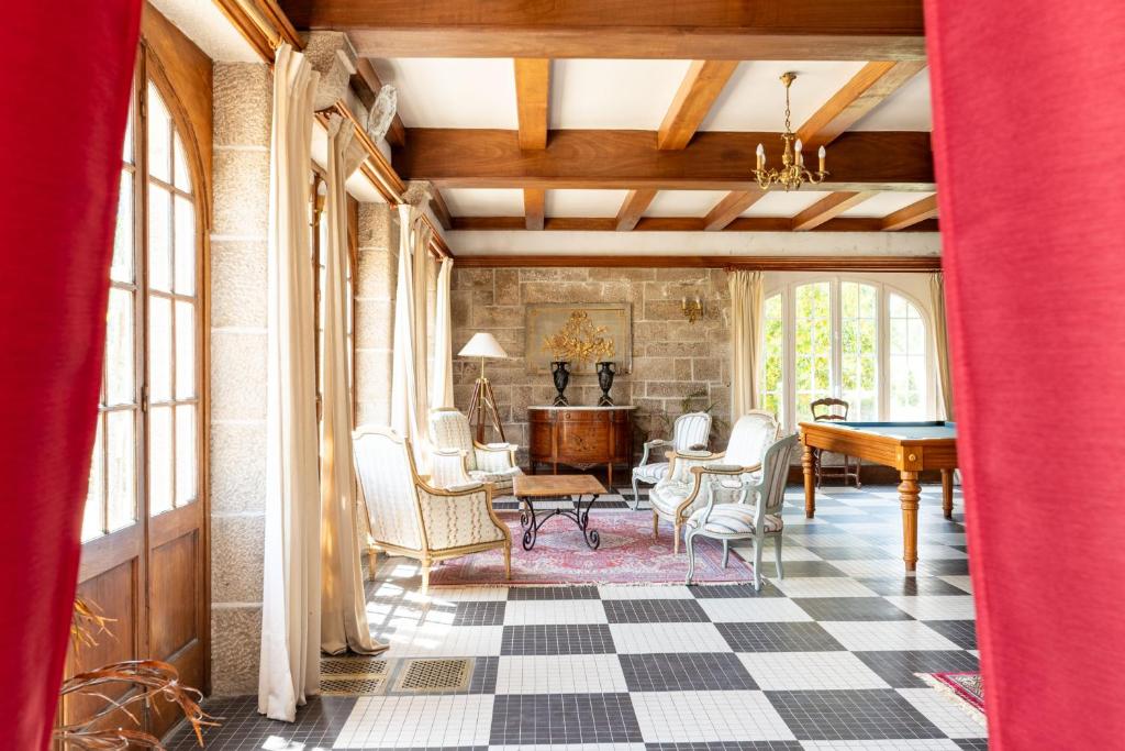 Posezení v ubytování Manoir Du Stang