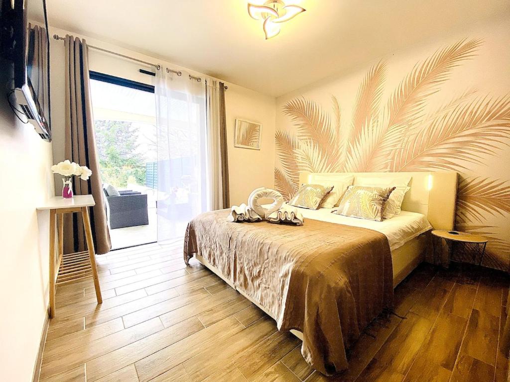 Postel nebo postele na pokoji v ubytování Villa Classée 3 étoiles familiale calme et nature