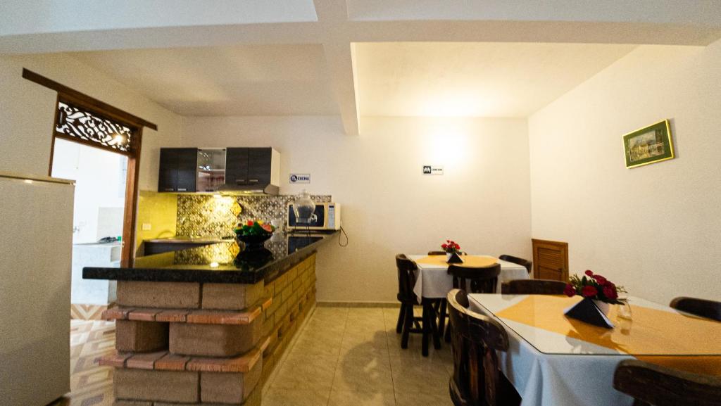 Cucina o angolo cottura di ApartaHotel Margaritas de la Villa VDL