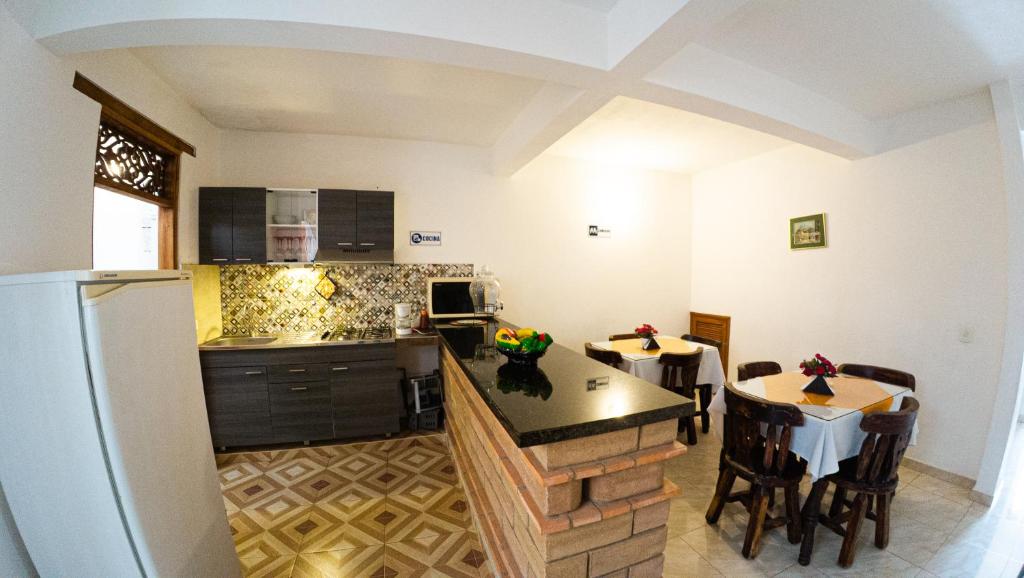 Cucina o angolo cottura di ApartaHotel Margaritas de la Villa VDL
