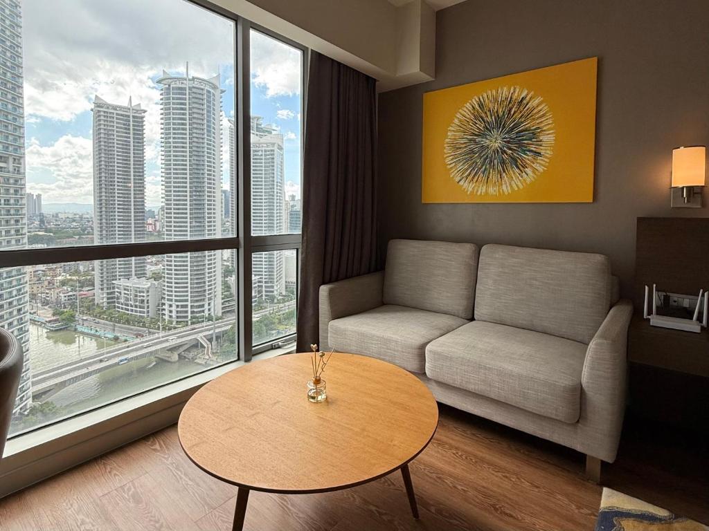 Posezení v ubytování Novotel Suites Celestia at Hotel Residences Acqua Manila