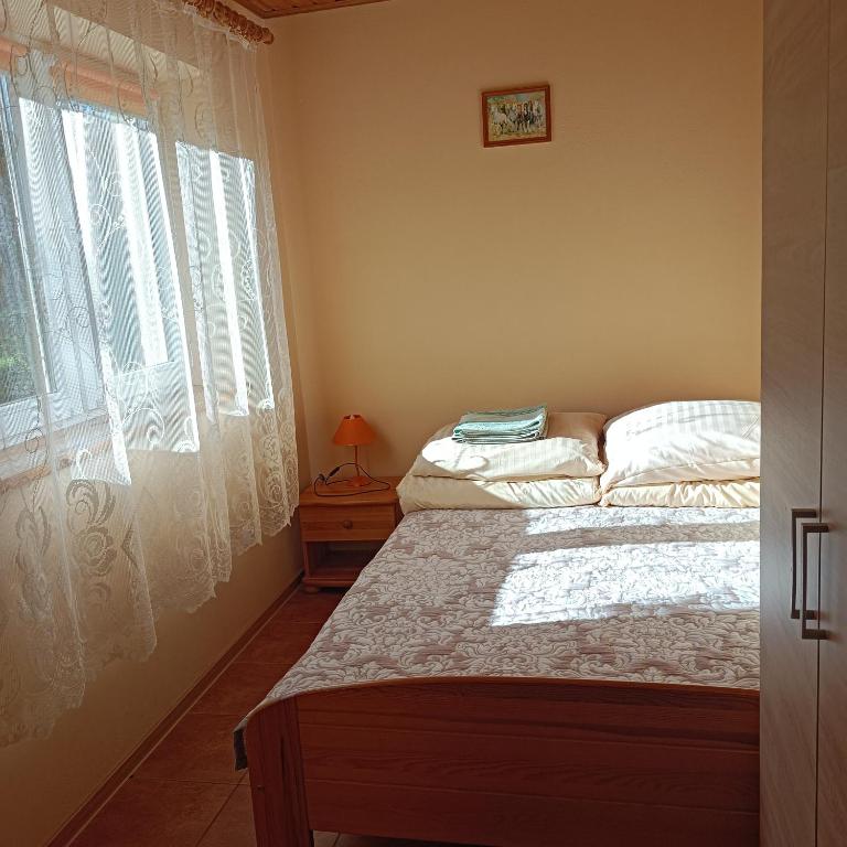 Ένα ή περισσότερα κρεβάτια σε δωμάτιο στο Apartament 2 osobowy