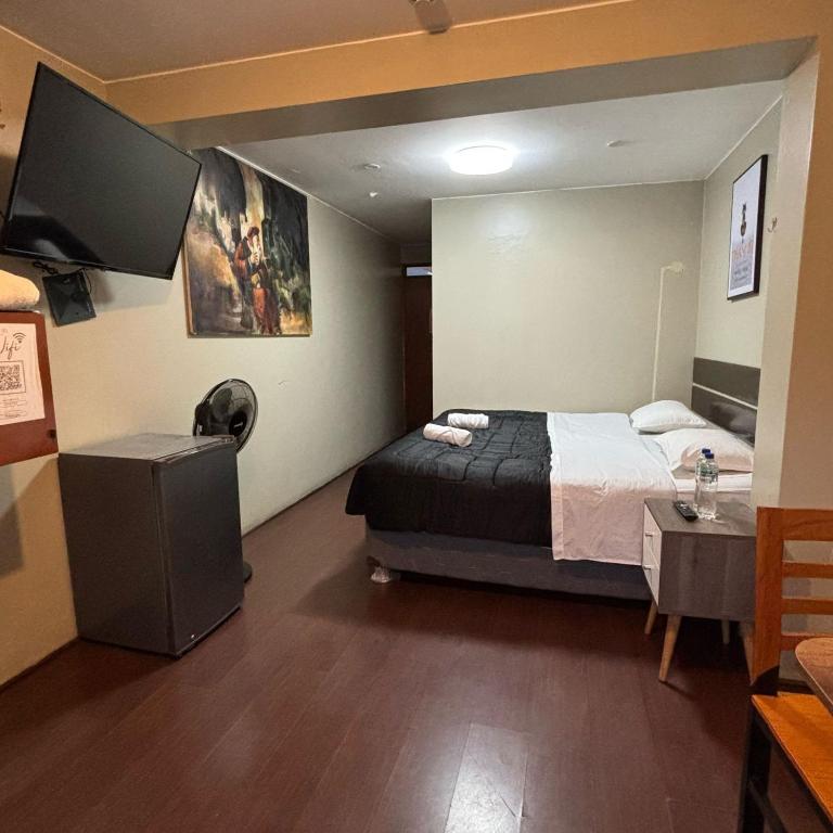 Voodi või voodid majutusasutuse PARTY HOSTEL THAY Miraflores Lima toas