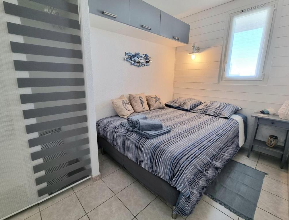 Postel nebo postele na pokoji v ubytování A La Plage
