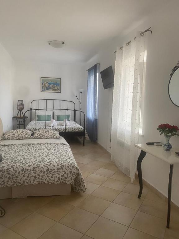 Postel nebo postele na pokoji v ubytování Villa ADA