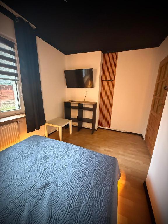 Postel nebo postele na pokoji v ubytování Siedlisko jura Florek