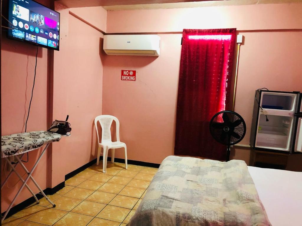 Postel nebo postele na pokoji v ubytování Chaleanor Hotel