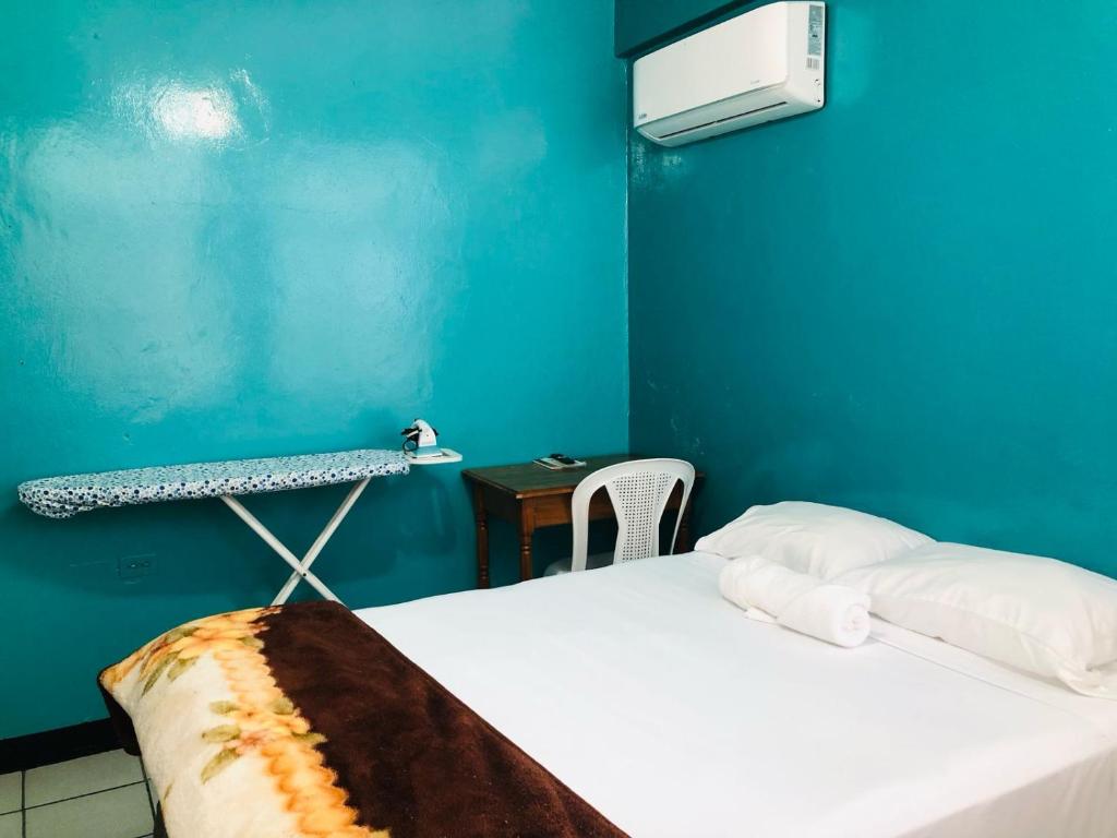 Postel nebo postele na pokoji v ubytování Chaleanor Hotel