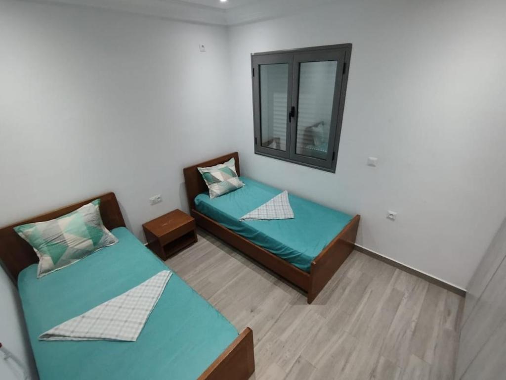 Postel nebo postele na pokoji v ubytování Résidence Inès Djerba Appartements VIP
