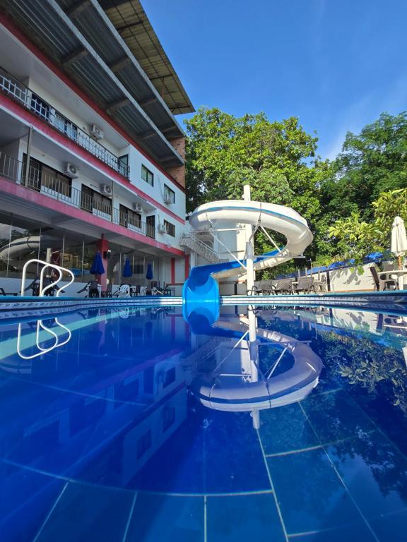 Bazén v ubytování Hotel Orquidea Dorada R nebo v jeho okolí