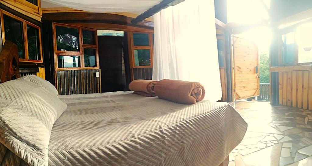 Postel nebo postele na pokoji v ubytování Casa Yantra La Lola