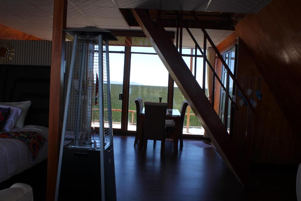Posezení v ubytování Titicaca Aruntawi Lodge Peru