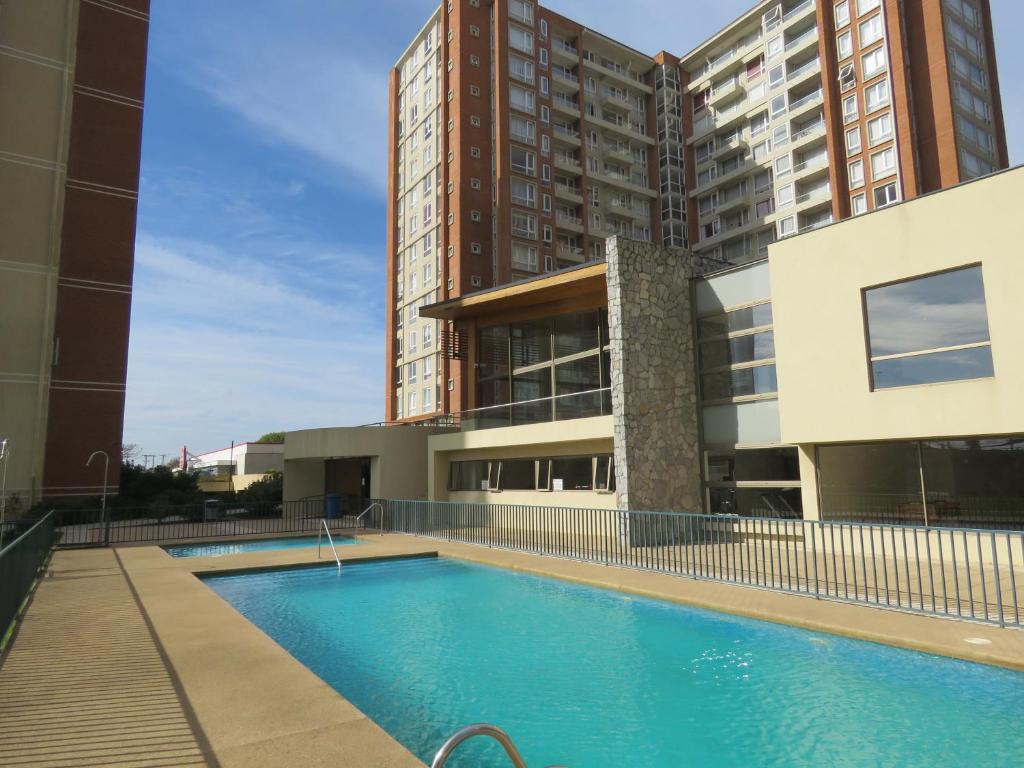 The swimming pool at or close to Concepción Suites