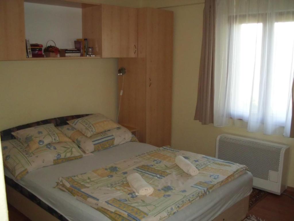 Posteľ alebo postele v izbe v ubytovaní Zalakaros Panoráma Apartmanok