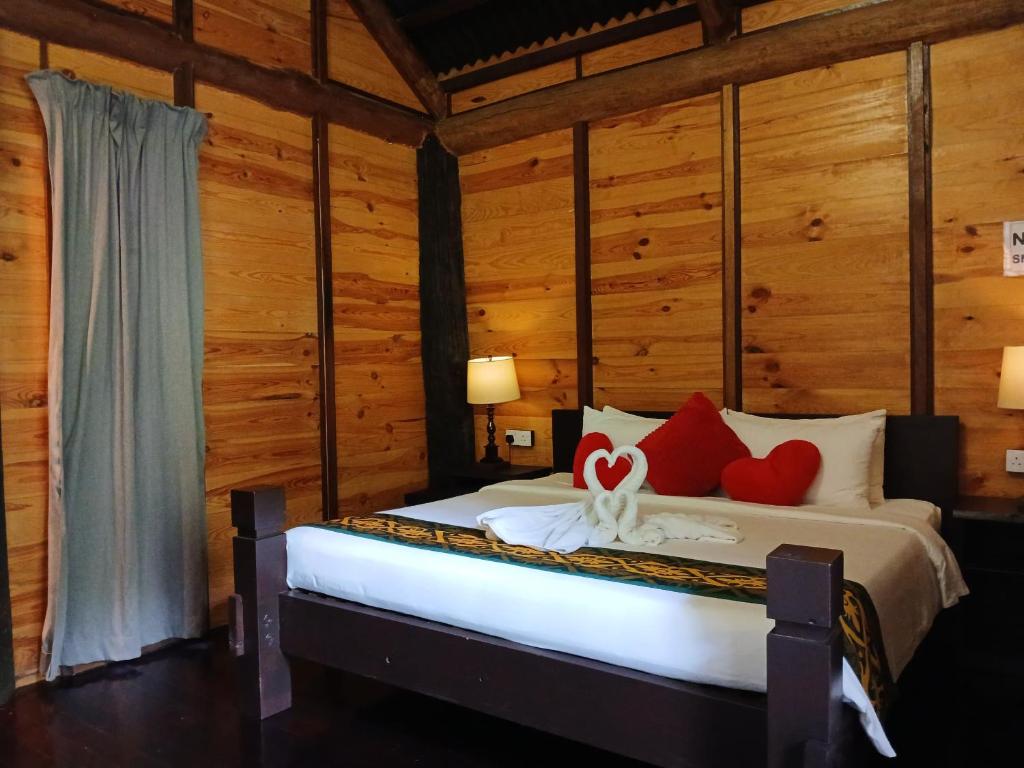 Postel nebo postele na pokoji v ubytování Naluyan Jungle Lodge