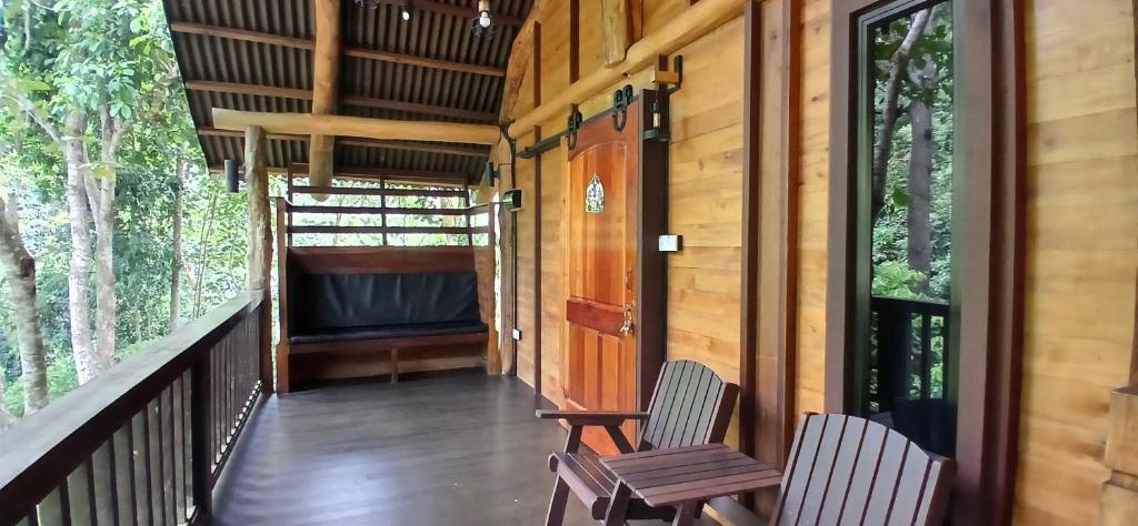 Balkón nebo terasa v ubytování Naluyan Jungle Lodge