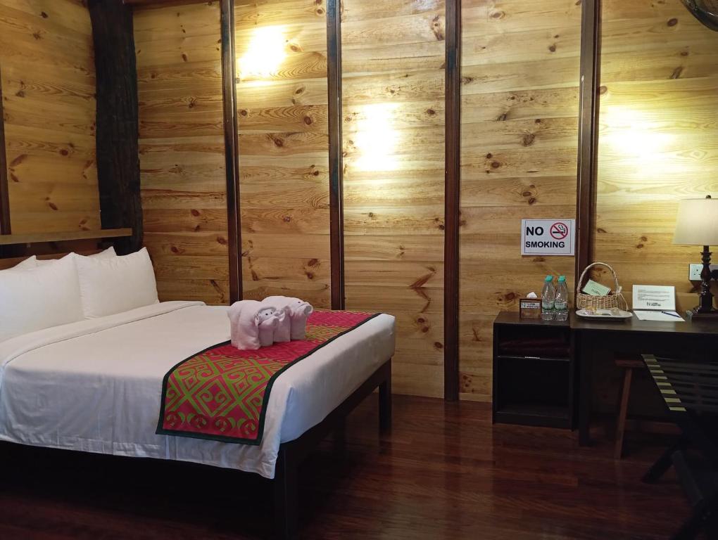 Postel nebo postele na pokoji v ubytování Naluyan Jungle Lodge