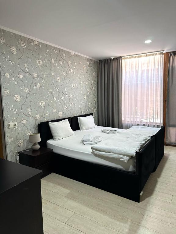 Postel nebo postele na pokoji v ubytování Hotel Alaverdi Palace