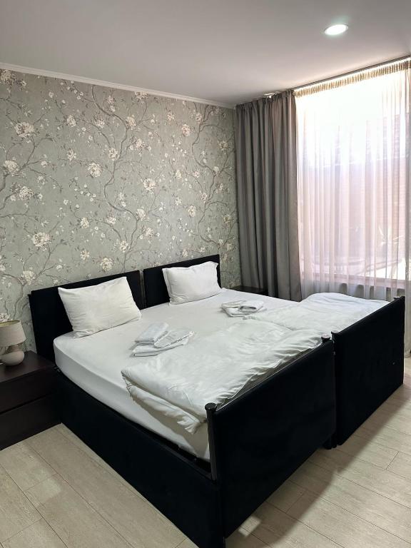 Postel nebo postele na pokoji v ubytování Hotel Alaverdi Palace