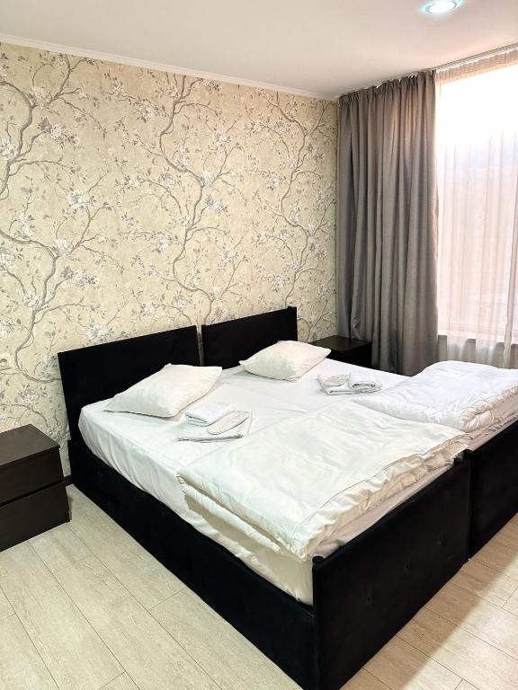 Postel nebo postele na pokoji v ubytování Hotel Alaverdi Palace