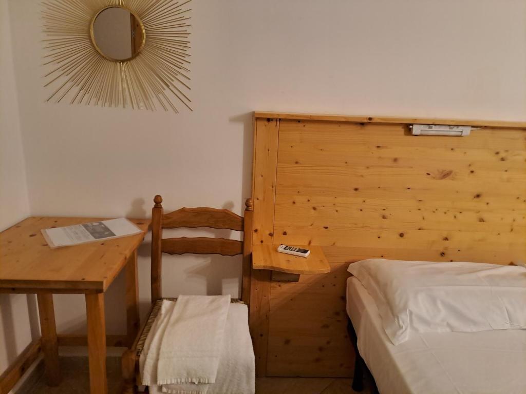 Postel nebo postele na pokoji v ubytování BBcamere policlinico