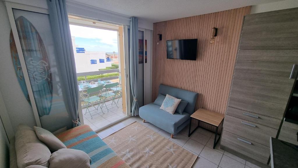 TV a/nebo společenská místnost v ubytování A La Plage