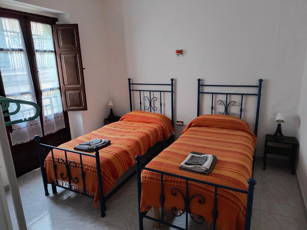 Postel nebo postele na pokoji v ubytování Casa Titti. Intero Appartamento - Fossacesia