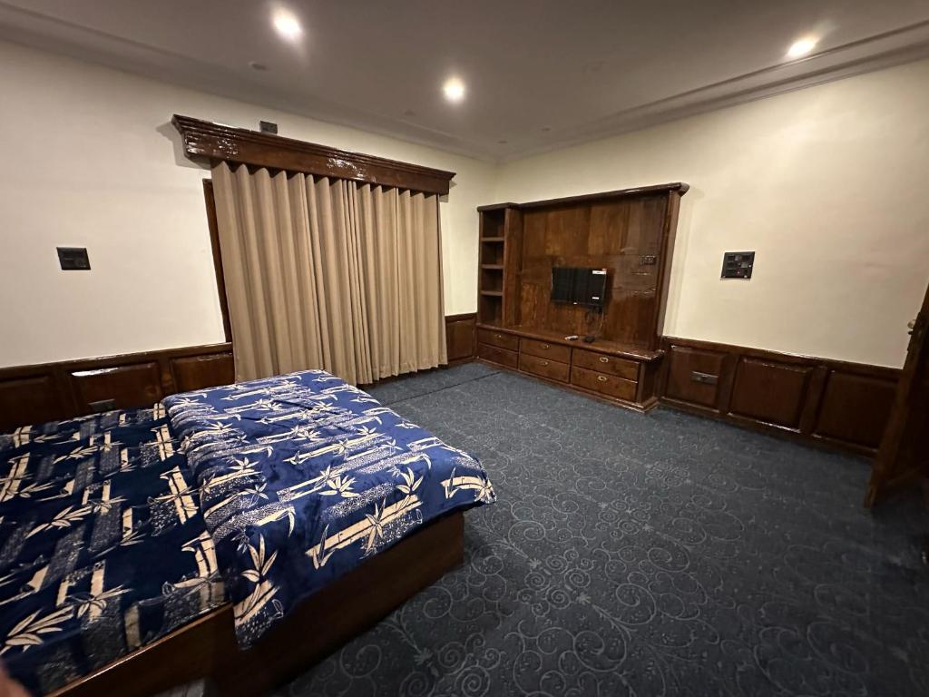 Postel nebo postele na pokoji v ubytování Taha Inn Home comfort