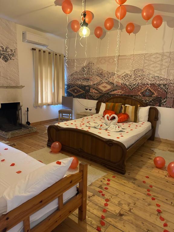 Postel nebo postele na pokoji v ubytování VILA DISHA