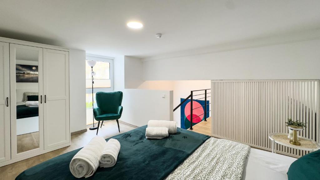 Voodi või voodid majutusasutuse Loftas Smaragdas toas