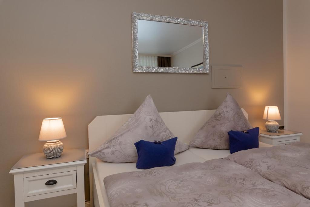 Postel nebo postele na pokoji v ubytování Hotel Berlin