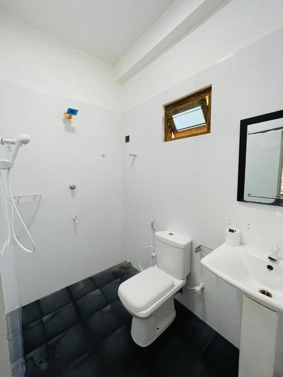 Koupelna v ubytování Natraj Guest House