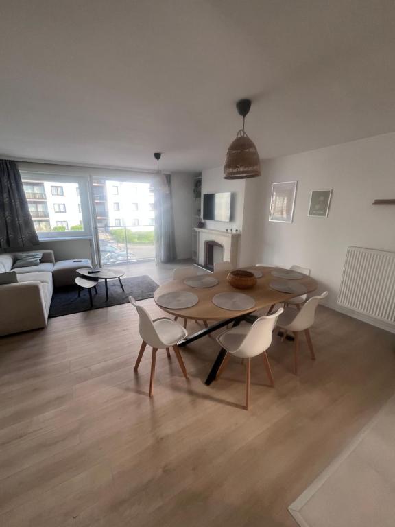 Posezení v ubytování appartement 101 place Léopold 1er à la panne à 100m de la plage