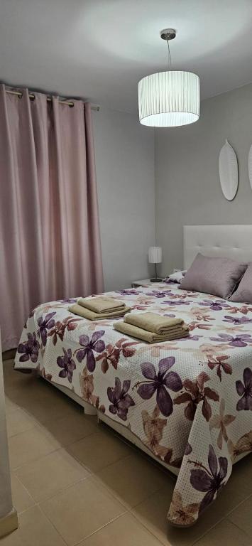 Postel nebo postele na pokoji v ubytování Los Cancajos Apartamento Acijoa