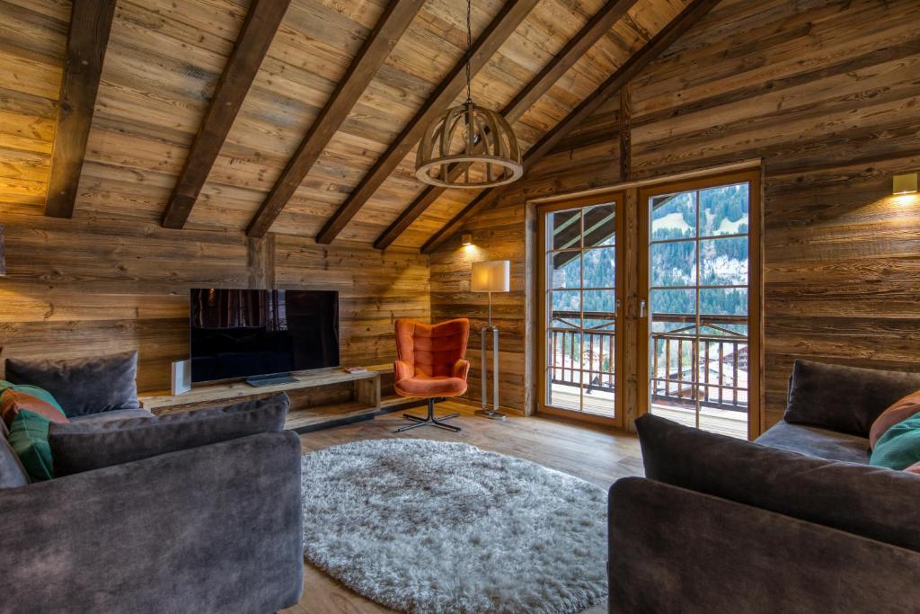 TV a/nebo společenská místnost v ubytování Hlianthme, The Lofty Penthouse