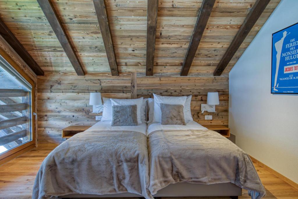 Postel nebo postele na pokoji v ubytování Hlianthme, The Lofty Penthouse