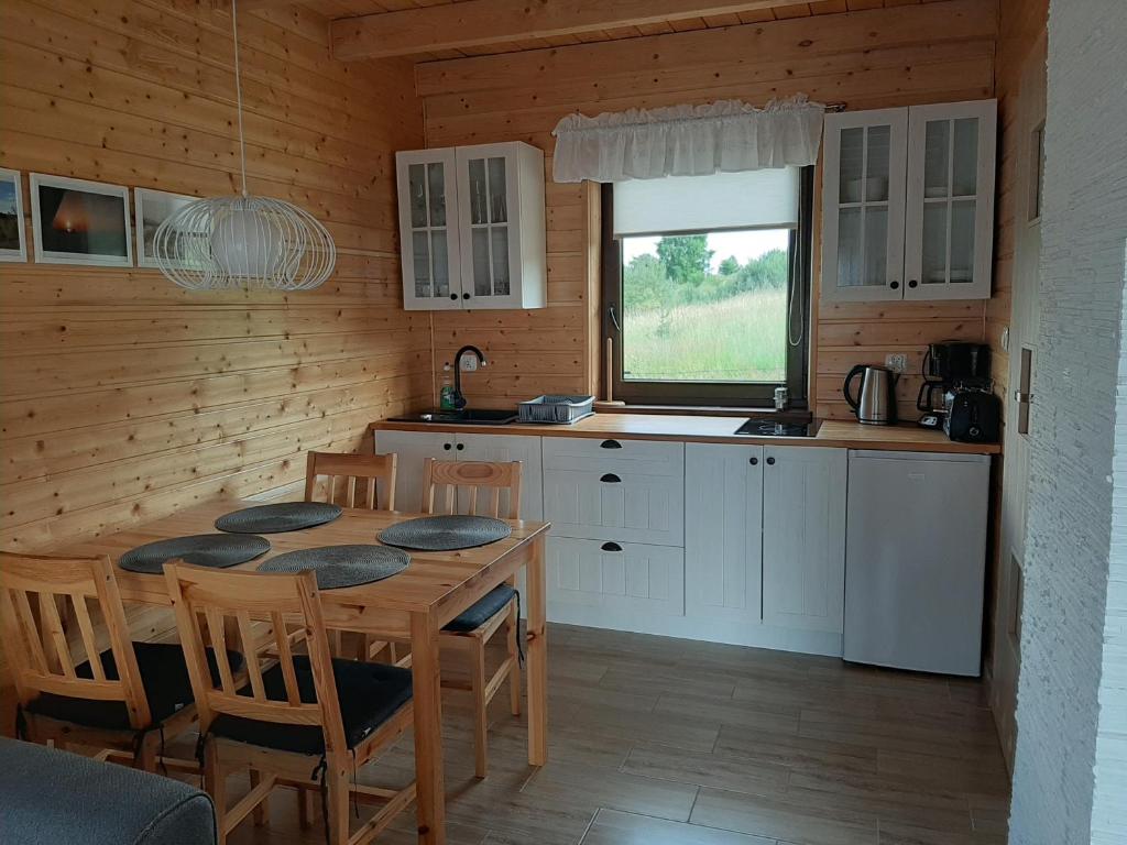 Kuchyňa alebo kuchynka v ubytovaní Czarcie Chatki