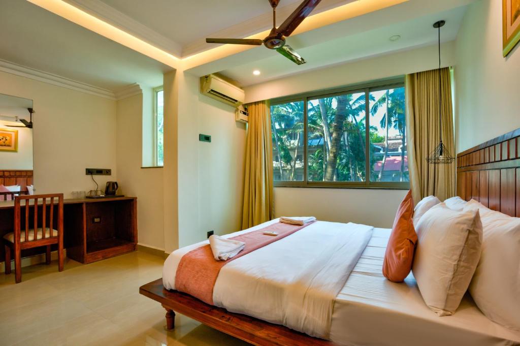 Postelja oz. postelje v sobi nastanitve Bliss By Stays, Calangute