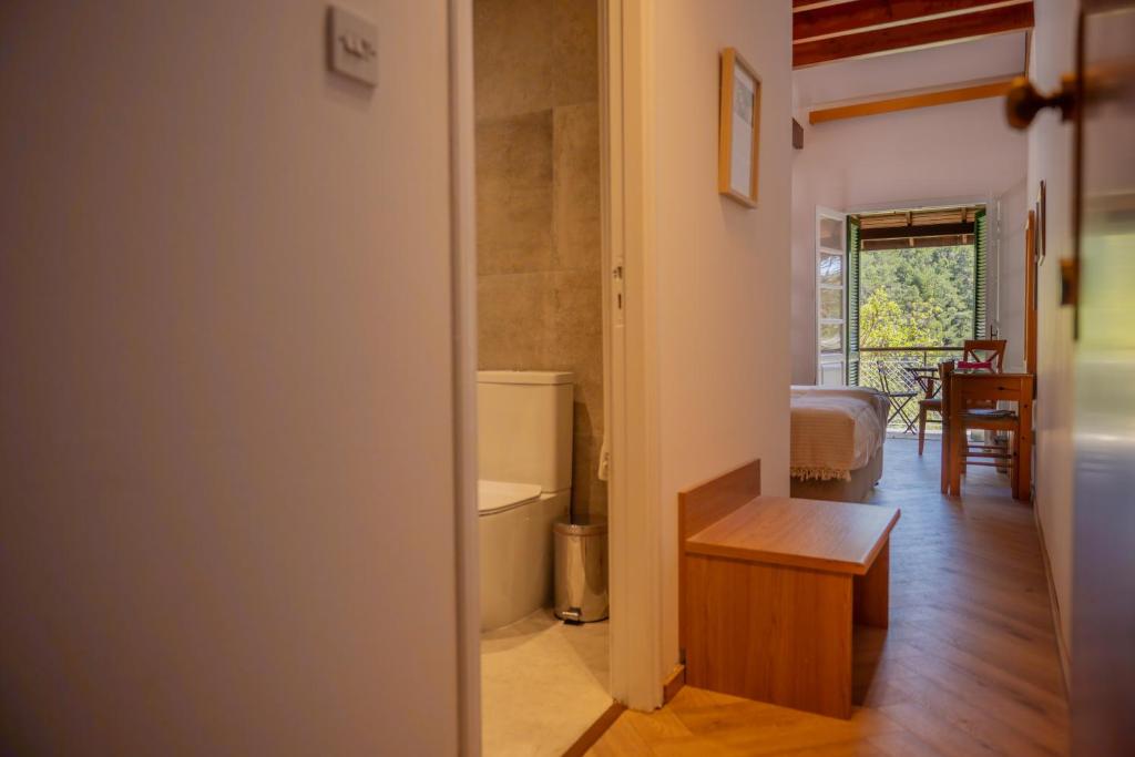 Koupelna v ubytování New Helvetia Hotel