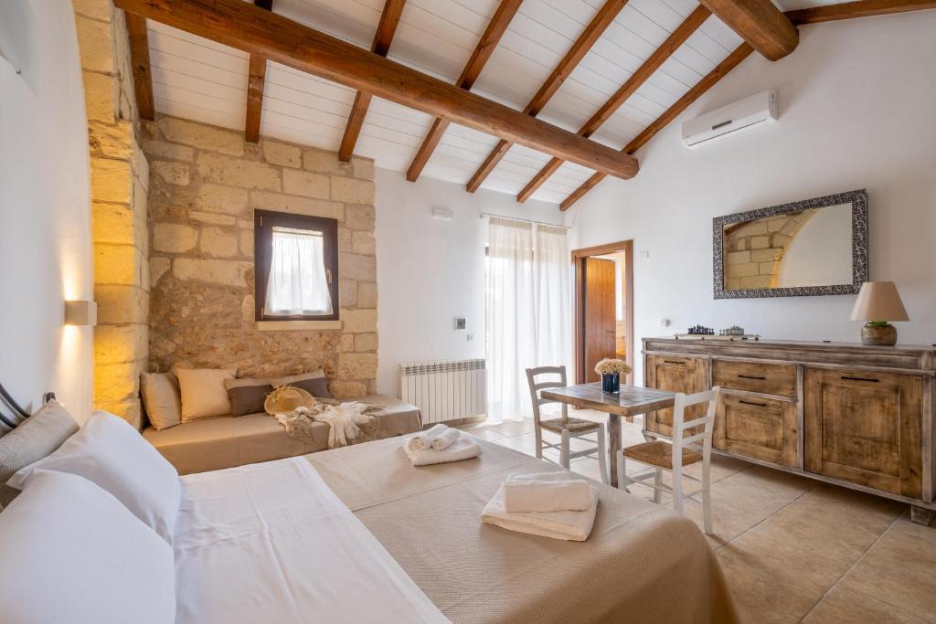 TV a/nebo společenská místnost v ubytování Agriturismo Costarella Masseria
