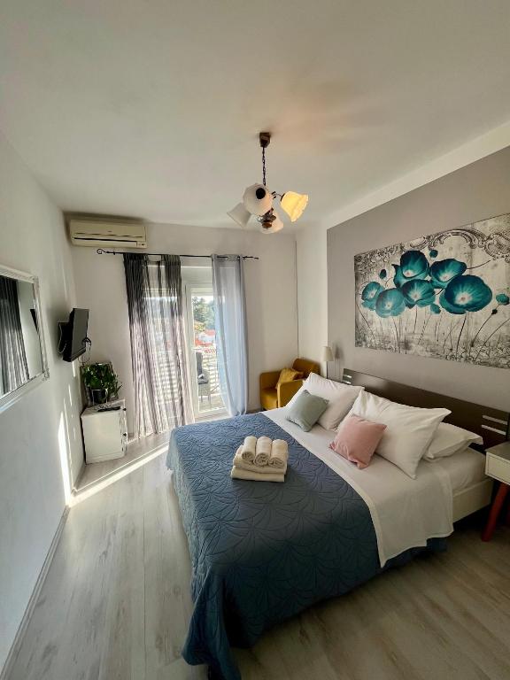 Postel nebo postele na pokoji v ubytování B&B Buzolic