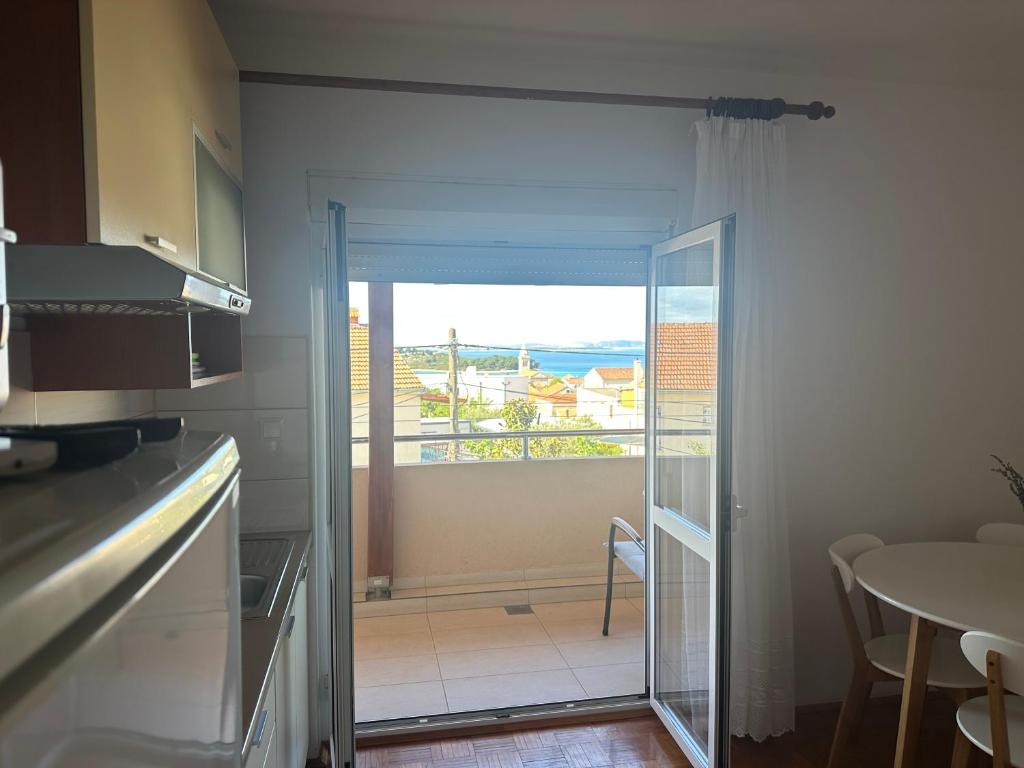 Kuchyň nebo kuchyňský kout v ubytování Apartments Iva