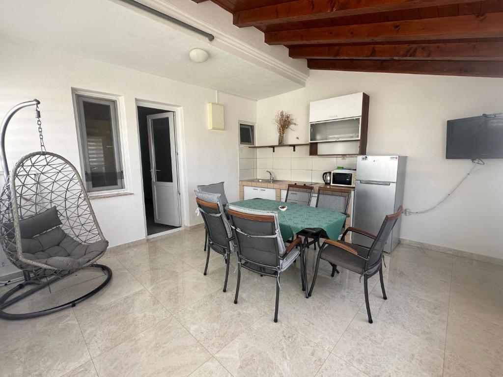 Kuchyň nebo kuchyňský kout v ubytování Apartments Iva