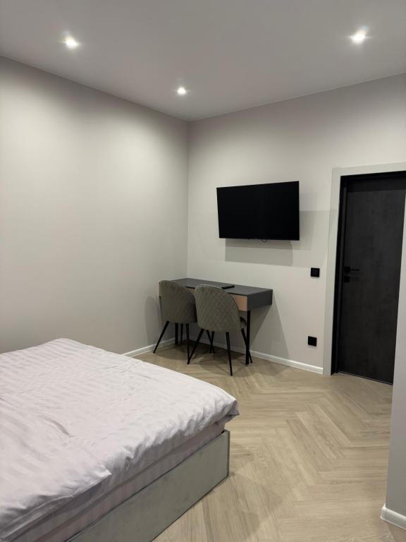 TV a/nebo společenská místnost v ubytování mini-hotel Neptun
