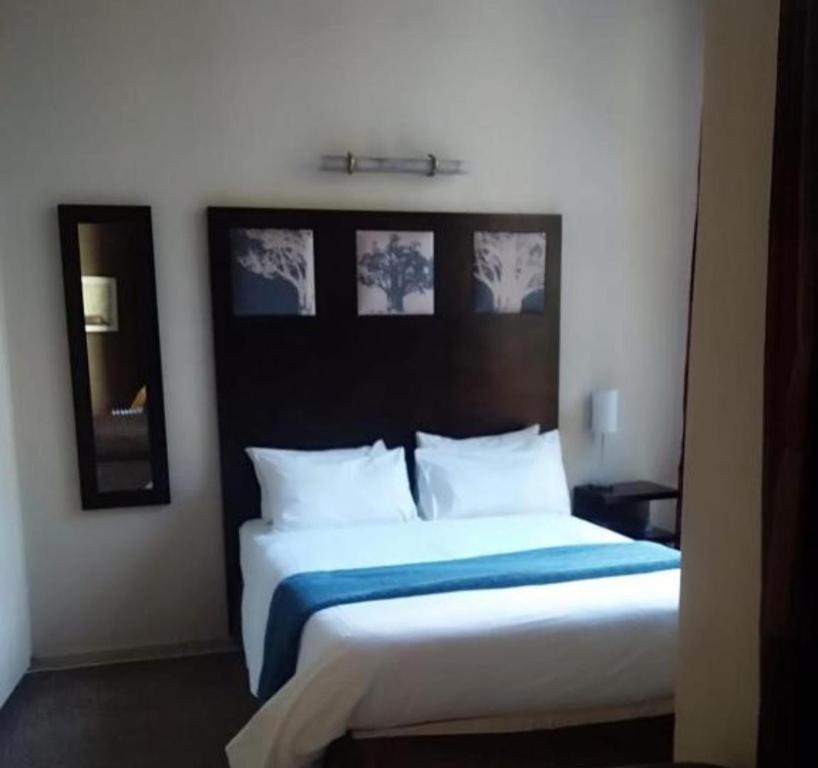 Ένα ή περισσότερα κρεβάτια σε δωμάτιο στο newfelling guest house